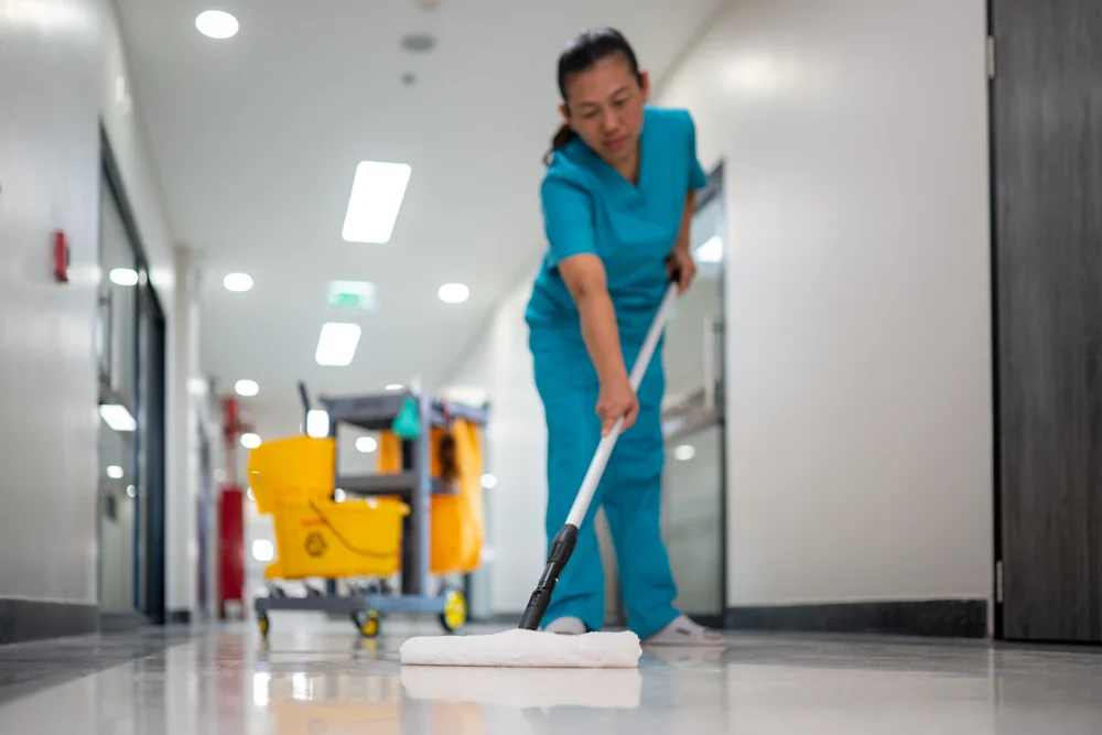a-woman-in-a-blue-scrub-sui
